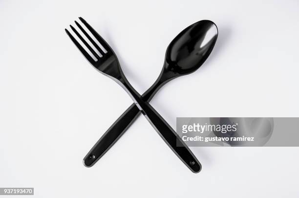 black plastic cutlery - küchenmesser freisteller stock-fotos und bilder