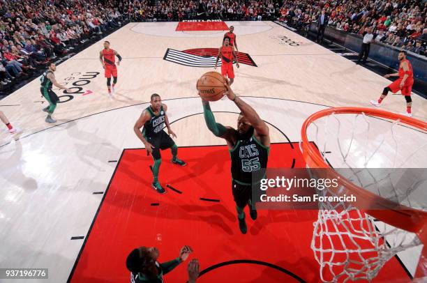 Jonathan Holmes of the Boston Celtics grabs the rebound against the Portland Trail Blazers on March 23, 2018 at the Moda Center in Portland, Oregon....