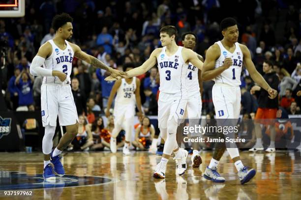 Gary Trent Jr. #2, Grayson Allen and Trevon Duval of the Duke Blue Devils celebrate after defeating the Syracuse Orange in the 2018 NCAA Men's...