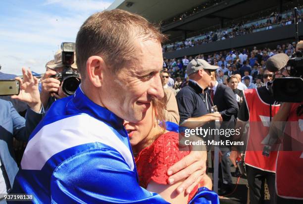 Hugh Bowman hugs wife Christine after winning the George Ryder Stakes on Winxduring Golden Slipper Day at Rosehill Gardens on March 24, 2018 in...