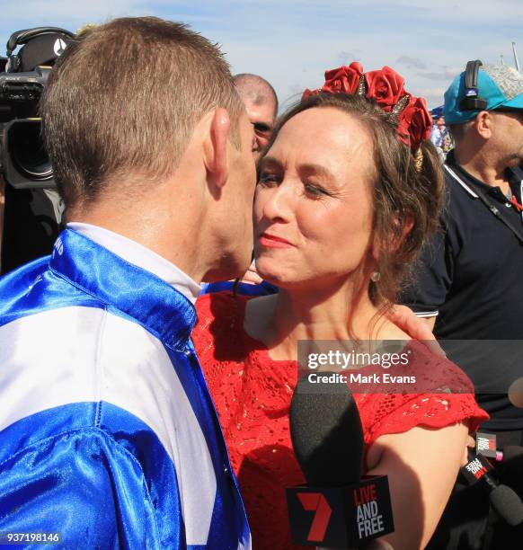 Hugh Bowman hugs wife Christine after winning the George Ryder Stakes on Winxduring Golden Slipper Day at Rosehill Gardens on March 24, 2018 in...
