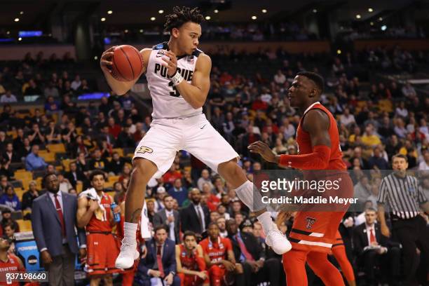 Carsen Edwards of the Purdue Boilermakers handles the ball against Norense Odiase of the Texas Tech Red Raiders during the second half in the 2018...