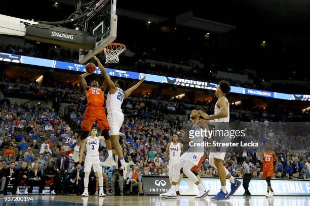 Tyus Battle of the Syracuse Orange dunks the ball against Marques Bolden of the Duke Blue Devils during the second half in the 2018 NCAA Men's...