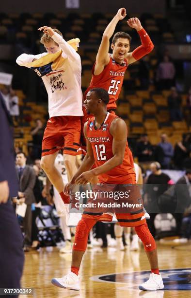Keenan Evans and Davide Moretti of the Texas Tech Red Raiders celebrate defeating the Purdue Boilermakers 78-65 in the 2018 NCAA Men's Basketball...