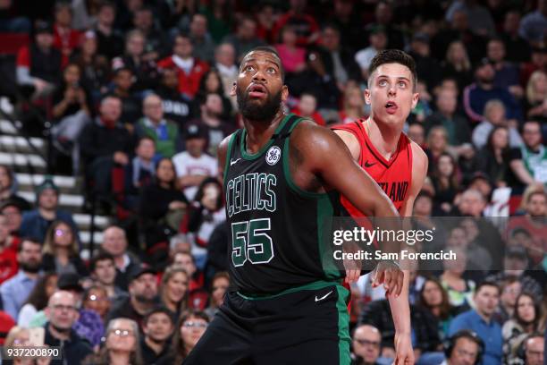 Jonathan Holmes of the Boston Celtics boxes out against the Portland Trail Blazers on March 23, 2018 at the Moda Center in Portland, Oregon. NOTE TO...