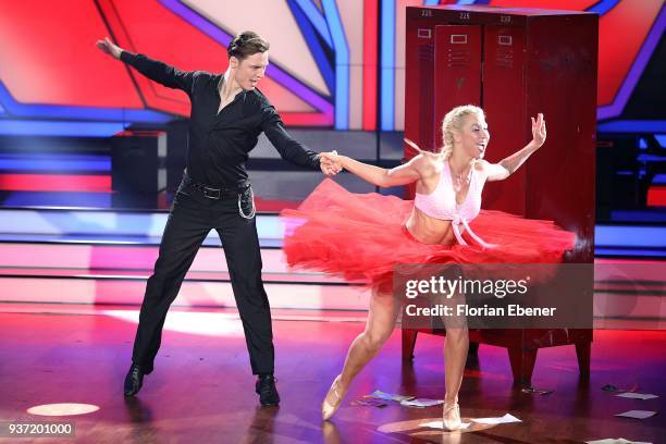 Heiko Lochmann and Kathrin Menzinger perform on stage during the 2nd show of the 11th season of the television competition 'Let's Dance' on March 23,...