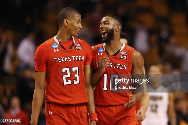 Jarrett Culver and Niem Stevenson of the Texas Tech Red Raiders celebrate defeating the Purdue Boilermakers 78-65 in the 2018 NCAA Men's Basketball...