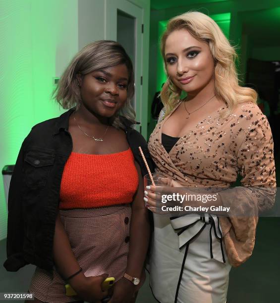 Mademoiselle Gloria and Saffron Barker attend the Nickelodeon Kids' Choice Awards "Slime Soirée" on March 23, 2018 in Venice, CA.