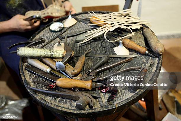 Shoemaker at work at the International Footwear Museum Of Vigevano on December 3, 2009 in Vigevano, Italy.