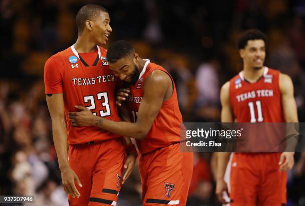 Jarrett Culver and Niem Stevenson of the Texas Tech Red Raiders celebrate defeating the Purdue Boilermakers 78-65 in the 2018 NCAA Men's Basketball...