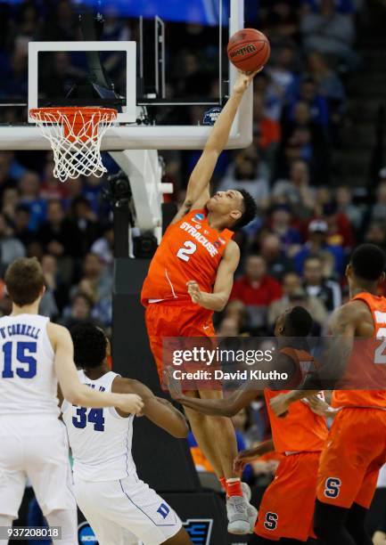 Syracuse Orange forward Matthew Moyer goes high to save a first-half rebound during the third round of the 2018 NCAA Photos via Getty Images Men's...