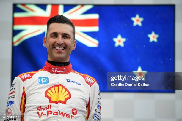 3rd place Fabian Coulthard driver of the Shell V-Power Racing Team Ford Falcon FGX celebrates on the podium during race 2 for the Supercars...