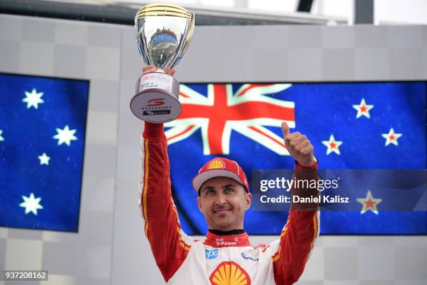 3rd place Fabian Coulthard driver of the Shell V-Power Racing Team Ford Falcon FGX celebrates on the podium during race 2 for the Supercars...