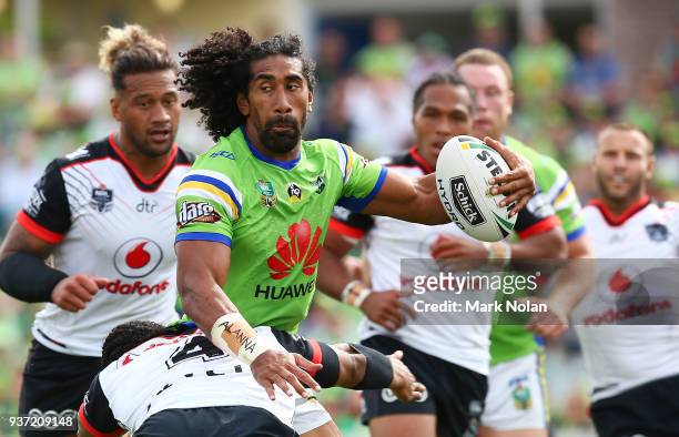 Sia Soliola of the Raiders looks to offload during the round three NRL match between the Canberra Raiders and the New Zealand Warriors at GIO Stadium...