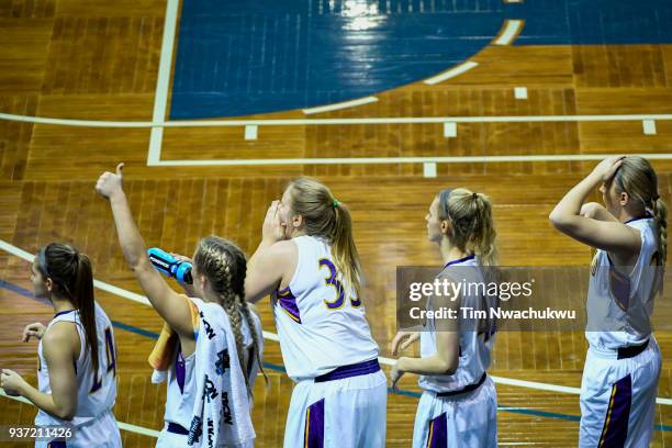 The Ashland University bench cheers on teammates during the Division II Women's Basketball Championship held at the Sanford Pentagon on March 23,...