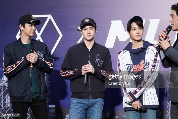 South Korean singers Chanyeol, Sehun and Kai of boy group EXO attend an opening ceremony of MLB store on March 23, 2018 in Hong Kong, China.