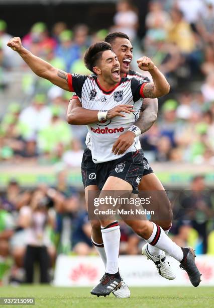 Shaun Johnson of the Warriors celebrates kicking a second field goal to win the round three NRL match between the Canberra Raiders and the New...