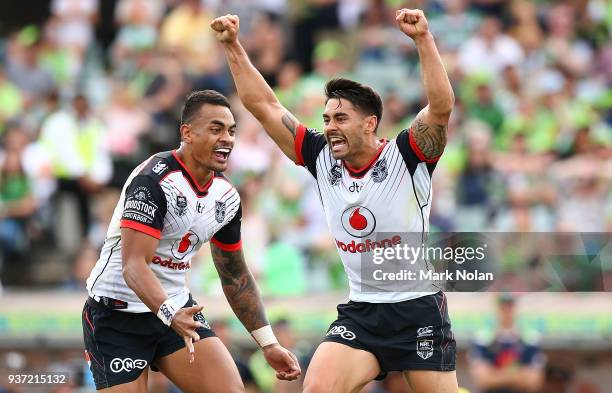 Shaun Johnson of the Warriors celebrates kicking a second field goal to win the round three NRL match between the Canberra Raiders and the New...
