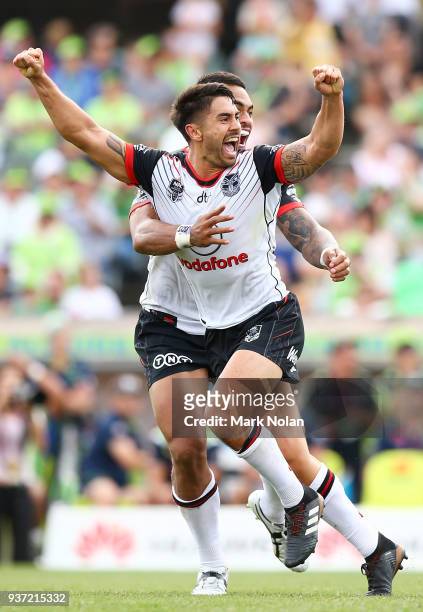 Shaun Johnson of the Warriors celebrates kicking a second field goal to win the round three NRL match between the Canberra Raiders and the New...