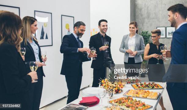 business conference and event - chat canapé stock pictures, royalty-free photos & images