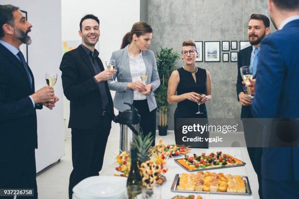 business conference and event - chat canapé stock pictures, royalty-free photos & images