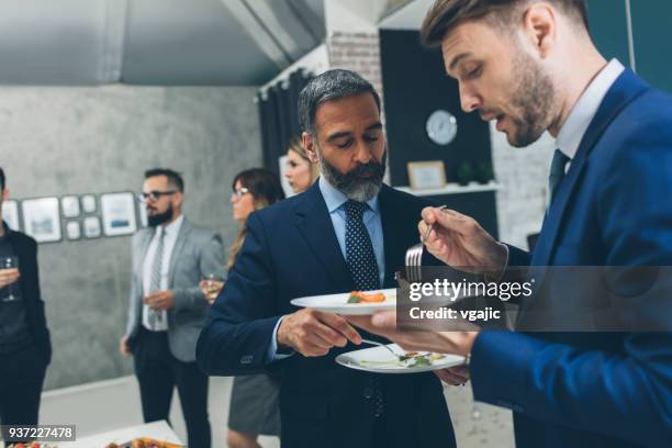 business conference and event - chat canapé stock pictures, royalty-free photos & images