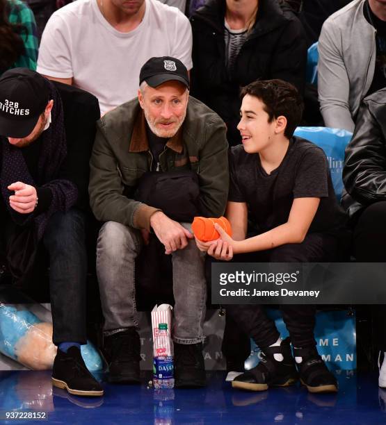 Jon Stewart and Nathan Stewart attend New York Knicks Vs Minnesota Timberwolves game at Madison Square Garden on March 23, 2018 in New York City.