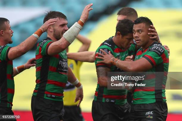 Richie Kennar of the Rabbitohs celebrates a try with team mates during the round three NRL match between the South Sydney Rabbitohs and the Manly Sea...