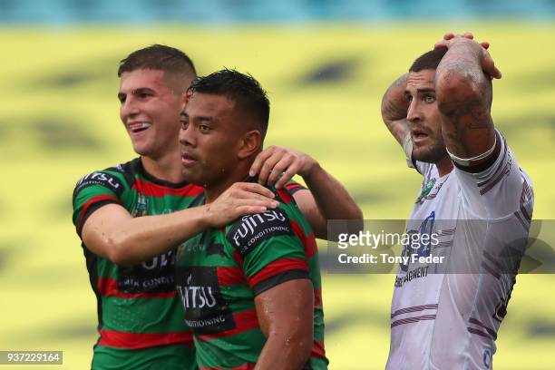 Richie Kennar of the Rabbitohs celebrates a try with a team mate during the round three NRL match between the South Sydney Rabbitohs and the Manly...