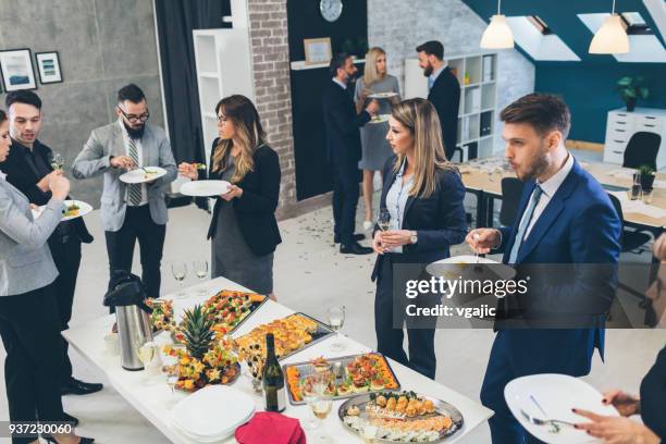 business conference and event - chat canapé stock pictures, royalty-free photos & images