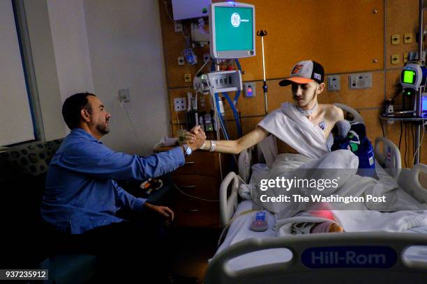 Faran Kaplan visits with his son Benjamin in the hospital on Wednesday, September 27, 2017 in Falls Church, Virginia. Faran has slept at his son's...