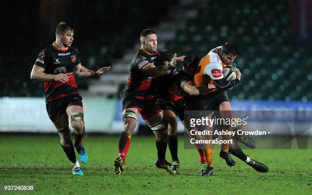 Cheetahs' Francois Venter is tackled by Dragons' Connor Edwards during the Guinness PRO14 Round 18 match between Dragons and Toyota Cheetahs at...