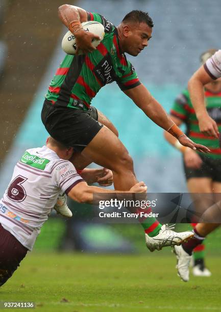 Richie Kennar of the Rabbitohs is tackled during the round three NRL match between the South Sydney Rabbitohs and the Manly Sea Eagles at ANZ Stadium...