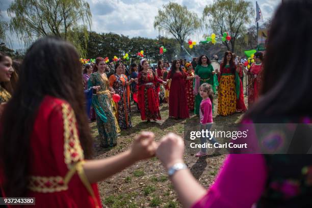 Kurdish women dance during Nowruz celebrations on March 24, 2018 in Tokyo, Japan. Nowruz meaning 'new day' and marking the first day of spring, is...