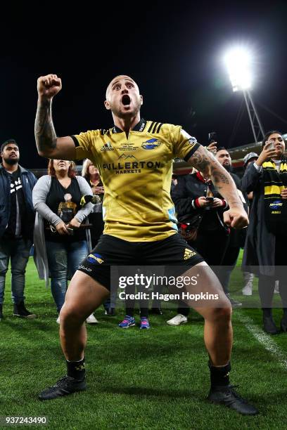 Perenara of the Hurricanes responds to a haka from supporters in recognition of his 100th game during the round six Super Rugby match between the...