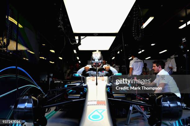 Lewis Hamilton of Great Britain and Mercedes GP prepares to drive in the garage during final practice for the Australian Formula One Grand Prix at...