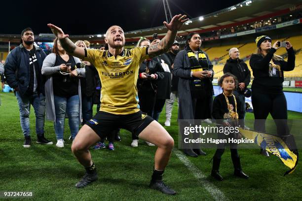 Perenara of the Hurricanes responds to a haka from supporters in recognition of his 100th game during the round six Super Rugby match between the...