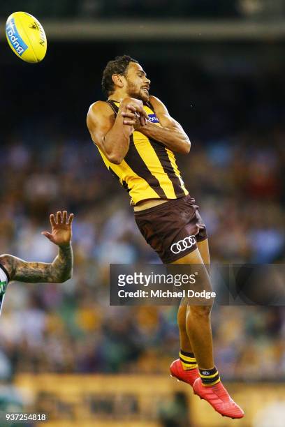 Cyril Rioli of the Hawks fumbles a mark during the round one AFL match between the Hawthorn Hawks and the Collingwood Magpies at Melbourne Cricket...