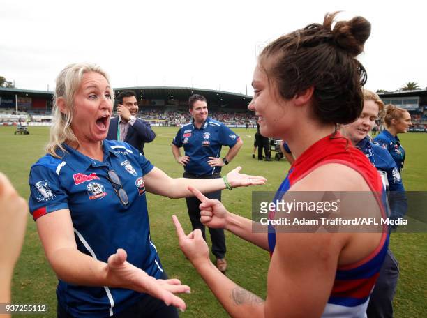 Ellie Blackburn of the Bulldogs celebrates with Debbie Lee, GM of women football at the Bulldogs during the 2018 AFLW Grand Final match between the...