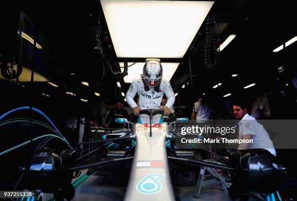 Lewis Hamilton of Great Britain and Mercedes GP prepares to drive in the garage during final practice for the Australian Formula One Grand Prix at...