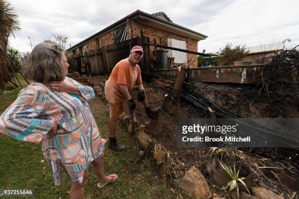 Richard and Helen Galton are pictured in the backyard of their Tathra, Australia home on March 24, 2018. During the recent bushfires Richard stayed...