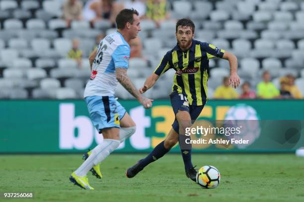Liam Rose of the Mariners contests the ball against Luke Wilkshire of Sydney FC during the round 24 A-League match between the Central Coast Mariners...