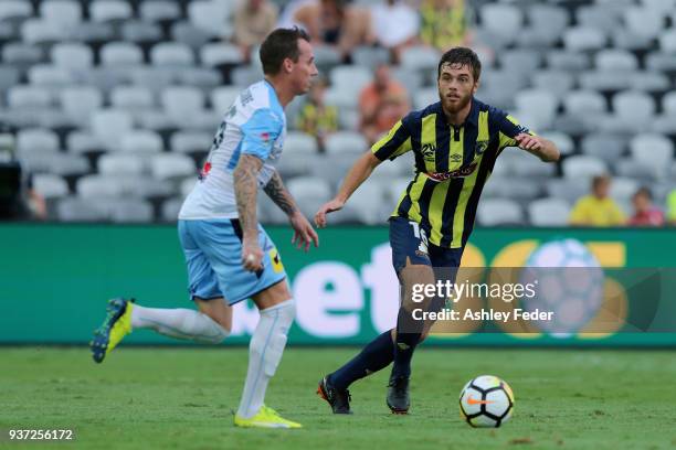 Liam Rose of the Mariners contests the ball against Luke Wilkshire of Sydney FC during the round 24 A-League match between the Central Coast Mariners...