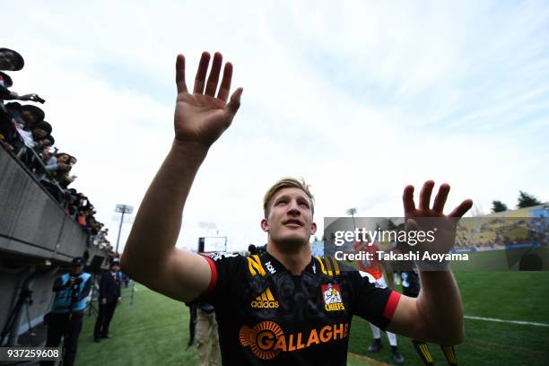 Damian McKenzie of the Chiefs applauds the fans after the Super Rugby match between Sunwolves and Chiefs at Prince Chichibu Memorial Groound on March...