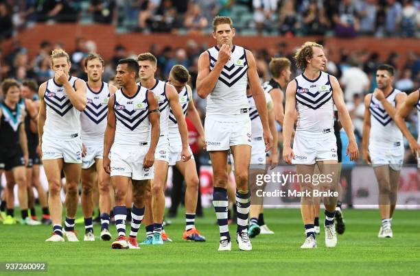 Aaron Sandilands of the Dockers leads his team off the ground during the round one AFL match between the Port Adelaide Power and the Fremantle...