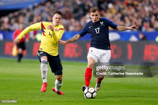 Lucas Digne of France controls the ball against Santiago Arias of Colombia during the international friendly match between France and Colombia at...