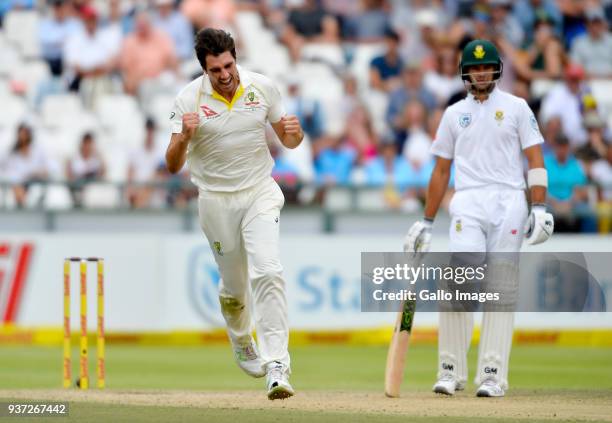 Pat Cummins of Australia celebrates after taking the wicket to dismiss Dean Elgar of South Africa during day 3 of the 3rd Sunfoil Test match between...