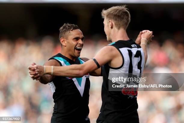 Dom Barry and Todd Marshall of the Power celebrate a goal during the 2018 AFL round 01 match between the Port Adelaide Power and the Fremantle...