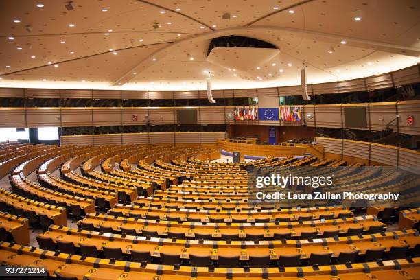 european parliament hemicycle - eu parlament stock-fotos und bilder