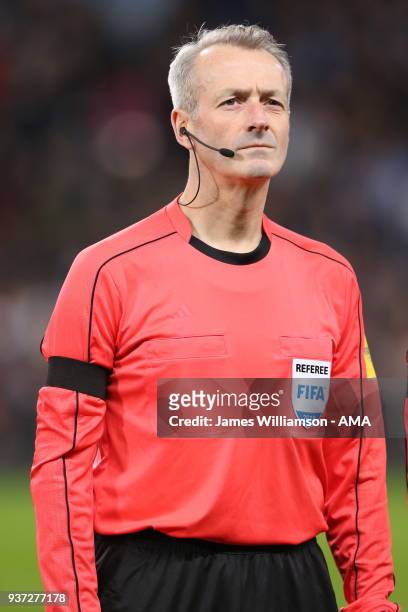 Match referee Martin Atkinson during an International Friendly fixture between Italy and Argentina at Etihad Stadium on March 23, 2018 in Manchester,...